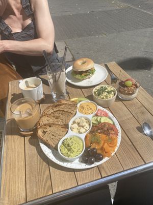Breakfast plate and cream cheese bagel at Plant Base in Berlin