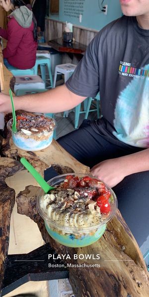 Green Bowl Base with vegan granola, almonds, chia seeds, strawbs, and banana  at Playa Bowls in Brighton
