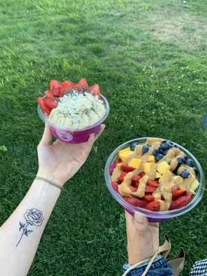 Pitaya bowl with vegan vanilla protein powder, bananas, strawbs, coco flakes, and chia seeds: Green bowl with strawbs, blubes, mango, and a peanut butter drizzle at Playa Bowls in Brighton