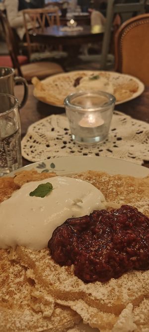 Vegan waffle with jam and whipped cream at Klockargårdens Våffleri in Grodinge