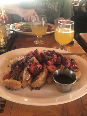Incredible vegan lemon infused berry french toast with mimosas!  at Fig Tree Cafe - Pacific Beach in San Diego