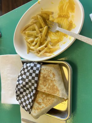 Loco Tostaritto and cheesy fries! Mmmm  at Vegos in Albuquerque