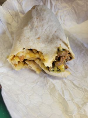Half eaten Going Back To Cali burrito (he was pretty hungry) at Vegos in Albuquerque