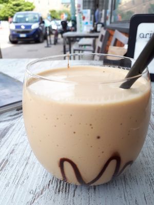 Ice coffee with almond milk at TINKA BAR & BISTROT in Nago-torbole