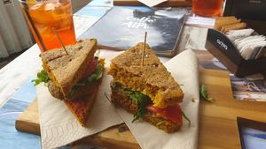 indian style sandwich with lentil patty at TINKA BAR & BISTROT in Nago-torbole