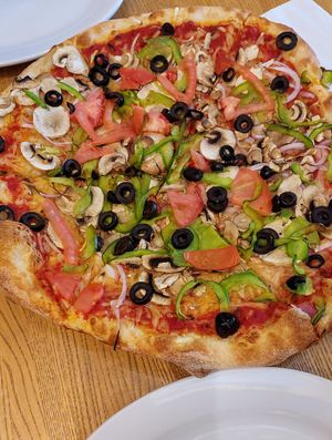 Their veggie pizza made vegan, light touch with the vegan cheese which was perfect for us. Light fluffy crust. at Piecasso in Stowe