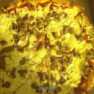 12'' vegan pizza with onions and mock pork at Brick Oven Pizzeria in Omaha