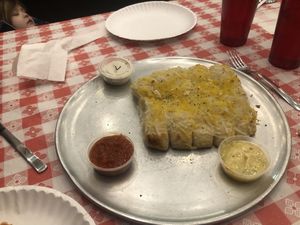 Garlic cheesy bread with vegan ranch, vegan garlic butter sauce and marinara  at Brick Oven Pizzeria in Omaha