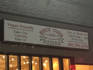 Sign outside  at Brick Oven Pizzeria in Omaha