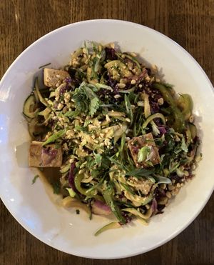 Zucchini Noodle Pad Thai. Excellent. Marinated tofu, zucchini noodles, bell peppers, garlic cabbage, green onions, peanuts & pad Thai sauce so good you want to drink it    at NorthStar Tavern in Bloomington