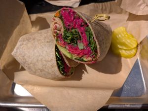I got the beet hummus wrap, avocado sub for feta at Mon Vert Cafe in Woodstock