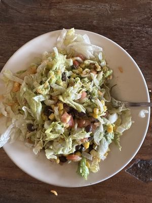 Burrito bowl mixed up a bit to see ingredients.   at El Azteca in Apple Valley