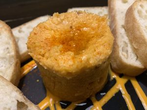 Almogrote canario: queso y mojo picón  at Lolín Cafe in Badalona