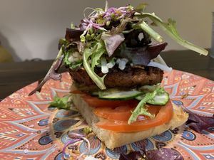 soy protein burger with vegan cheese  at Lolín Cafe in Badalona