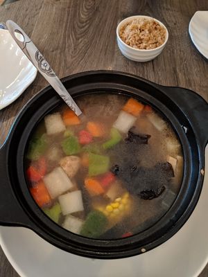 Herbal soup w veggies and mock fish filets at Jisu Vegetarian in New York City