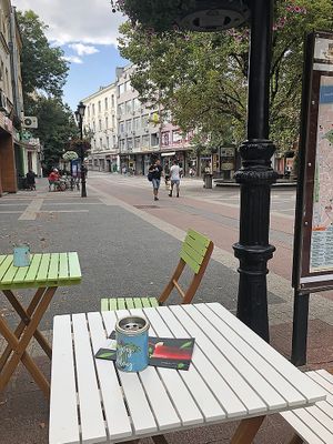 Tables and seats outdoors at Green Corner in Plovdiv