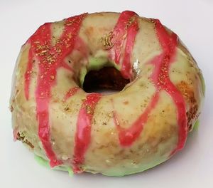 Lemon glazed with fresh raspberry swirls and sprinkled with mint at Namaste Donuts in Germantown