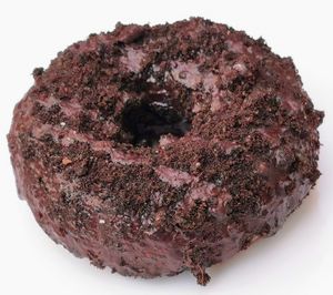 Chocolate glazed donut topped with crushed oreos (or your choice of chocolate sprinkles, graham crackers) at Namaste Donuts in Germantown