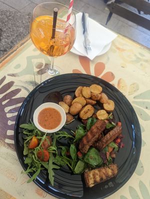 Smoked tempeh with chimichurri, potatoes and seasonal salad at Maslina in Rijeka