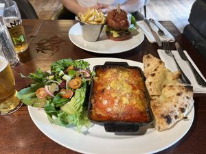 Spiced “lamb” style moussaka & symplicity burger with french fries  at The Akeman Inn in Aylesbury