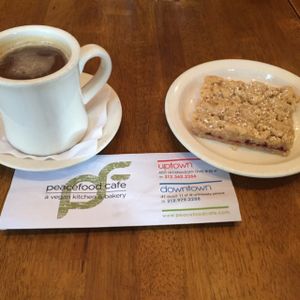 coffee and raspberry crumble at Peacefood Cafe - Uptown in New York City