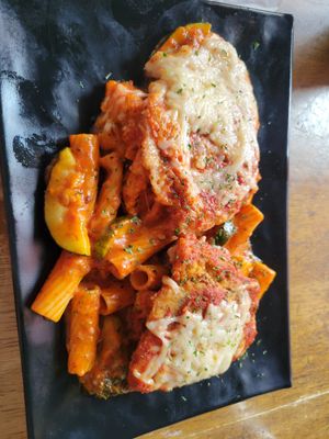 Parmesan rigatoni and pfc cutlet at Peacefood Cafe - Uptown in New York City