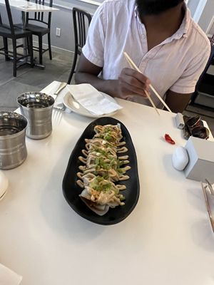 Spicy dumplings   at Peacefood Cafe - Uptown in New York City