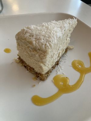 raw cashew cream cheesecake: cashew, lemon juice, coconut oil & agave in an almond cashew crust  at Peacefood Cafe - Uptown in New York City