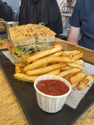 Burger and fries  at Peacefood Cafe - Uptown in New York City