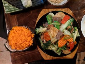 Combination hot plate with tomato rice 🤤 at Vina Vegan in Newtown