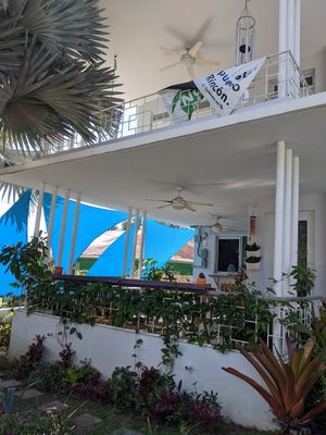 Patio seating in the shade at Passiflora in Rincon