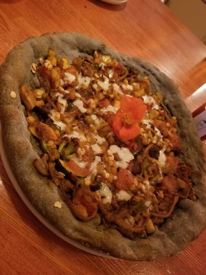 Pizza with unique hemp base at Nico-Simply in Nakano