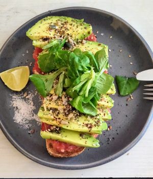 Toast Avocado Tomato Seeds Summach at Cinnamon in Bilbao