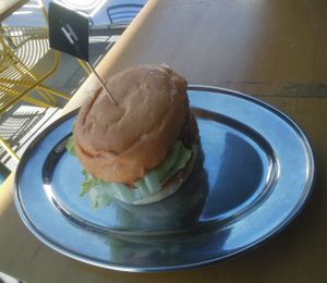 This vegan burger is called the "Sondra". Kale, zucchini & quinoa patty, hummus,  pickled onion, beetroot, tomato, lettuce. $12.90 at Huxtaburger in Footscray