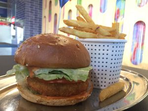 Vegan ‘chicken’ burger with small fries at Huxtaburger in Footscray