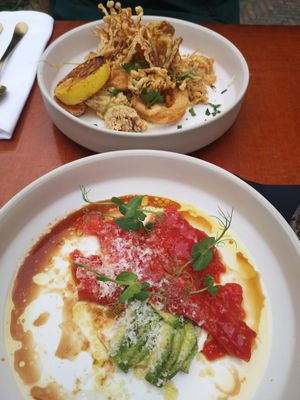 Carpaccio of watermelon and calamari fritti of different mushrooms   at Konijnenvoer in Arnhem