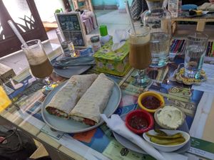 Zinger wrap and iced coffees at Bayt Sara in Amman