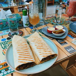 Shawarma and orange kombucha (also includes homemade vegan mayo and pickles)  at Bayt Sara in Amman