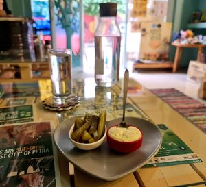 Pickles and garlic dip. at Bayt Sara in Amman