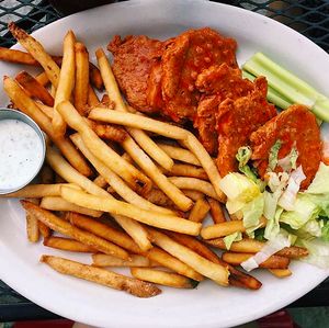 Vegan buffalo wings meal at The Remedy Diner in Raleigh