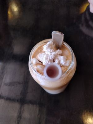 Iced coffee with vegan cream and oat milk at Mad Apple in Launceston