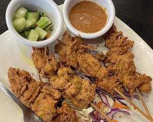 Soy (mock) Chicken Satay w/peanut sauce and cucumber chutney 💚  at Thotsakan in San Diego