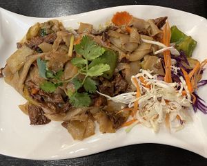 Vegan Drunken Noodles with mock duck 💚  at Thotsakan in San Diego