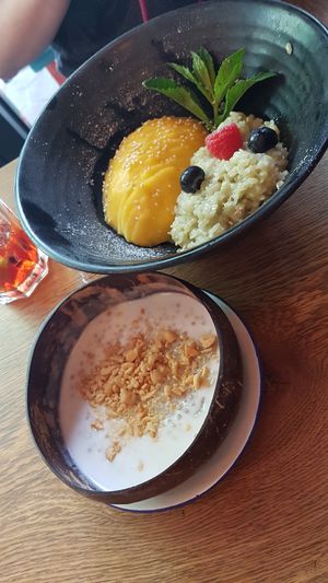 Vegan banana tapioca pearl dessert, mango sticky rice has condensed milk! at Bami House 1976 in Munich
