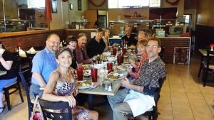 The group shares a vegan meal at a local restaurant  at Venice Holistic Community in Venice