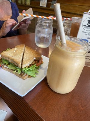 Tropical paradise smoothie with my GF blt in the background  at Little Palm in Fort Myers Beach