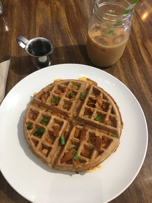 Coconut ‘bacon’ and cheeze waffle with a cold brew coffee with French vanilla coconut creamer  at Little Palm in Fort Myers Beach