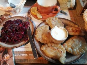 Sour kraut and beetroot salad. Cauliflower sweet potato peirogi at Pierogarnia Stary Młyn in Gdansk
