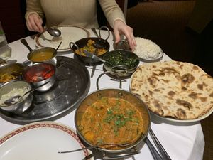 Tandoori roti, saag bhaji, aloo gobi and sabzi chili dhal, and plain rice at Tamanna in Aviemore