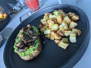 Avocado toast + mushrooms with new potatoes (vegan) at Marmalade in Merida